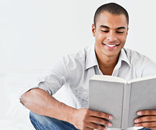 male reading a book